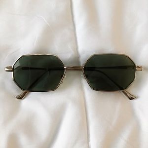 Gold rim sunglasses